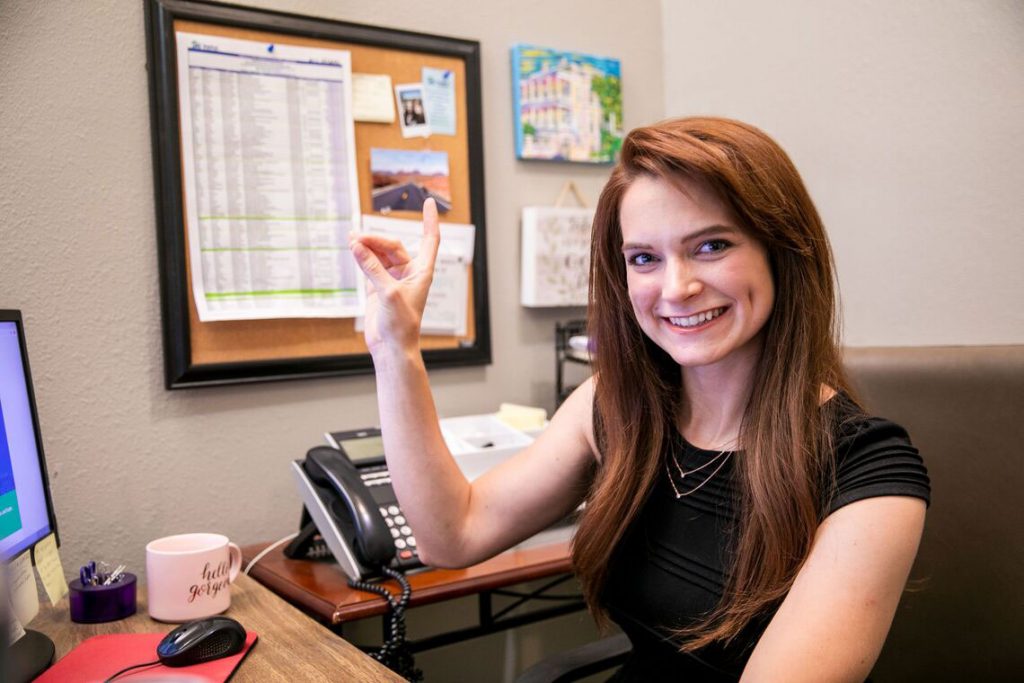 Person working at a desk with Lopes Up