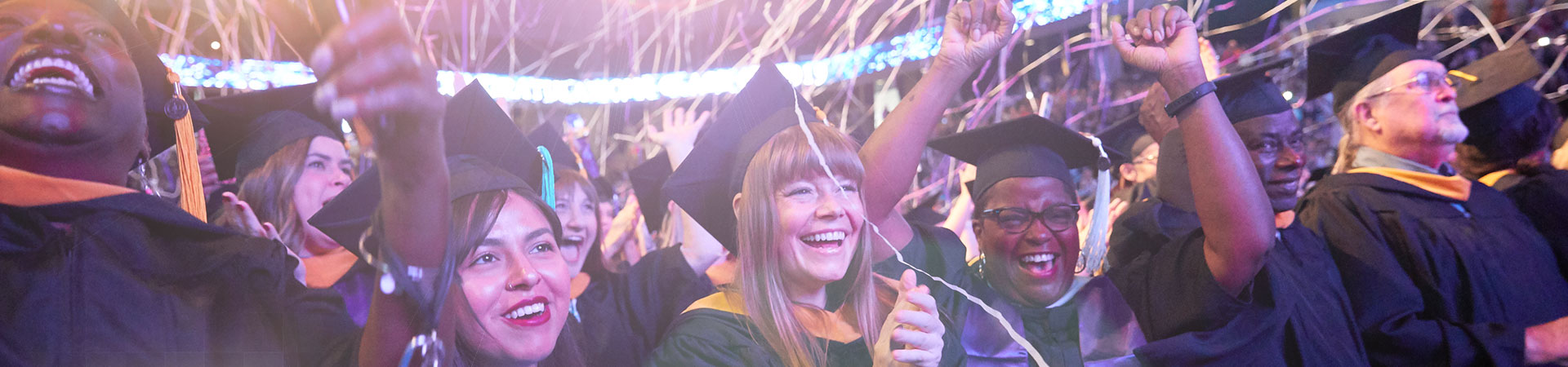 GCU students celebrating at commencement ceremony